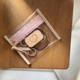 Jon Hart clear pocket pouch for chargers, small accessories, and everyday organization.