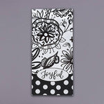 Black and white floral tea towel with polka dot border and joyful script detail