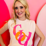 Light pink Just God tank with cropped fit and bold "JUST" integrated into the letter "G" of "GOD" in hot pink and orange.