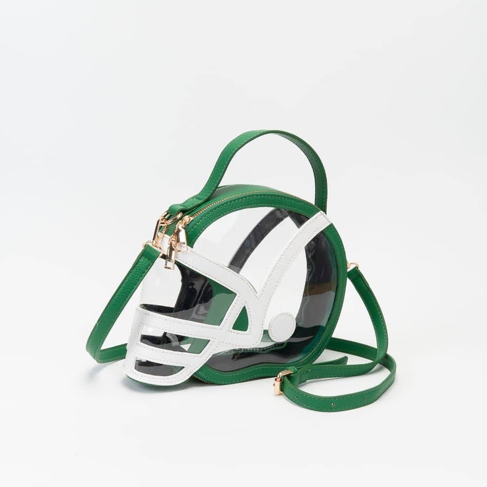 Clear football helmet crossbody bag with kelly green accents, gold hardware, and adjustable strap.