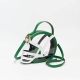 Clear football helmet crossbody bag with kelly green accents, gold hardware, and adjustable strap.