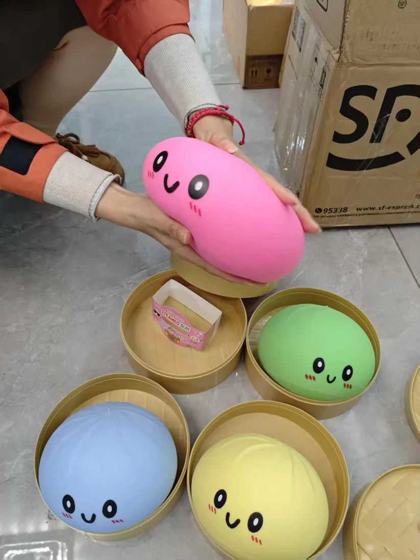 Large dumpling squishy stress toy with soft sensory texture.