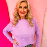 Lavender cotton raglan top with thumbhole cuffs.