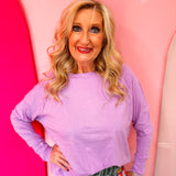 Lavender cotton raglan top with thumbhole cuffs.