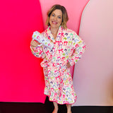 Daylight Bow robe with ruffle hem, long sleeves, and adjustable waist tie.