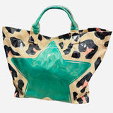 Leopard tote bag with bright green star detail and shiny finish.