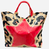 Leopard tote bag with bright pink star detail and shiny finish.
