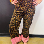 Brown leopard wide leg jeans with red and white gingham scalloped hems.