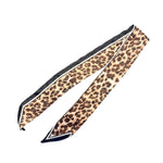 Neutral leopard print twilly scarf with black border and white trim