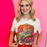Cream leopard graphic tee with jeweled star chair and patriotic accents.