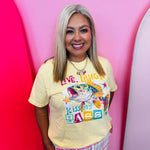 Yellow Comfort Colors tee with colorful bass fish graphic and Live Laugh Kiss My Bass slogan