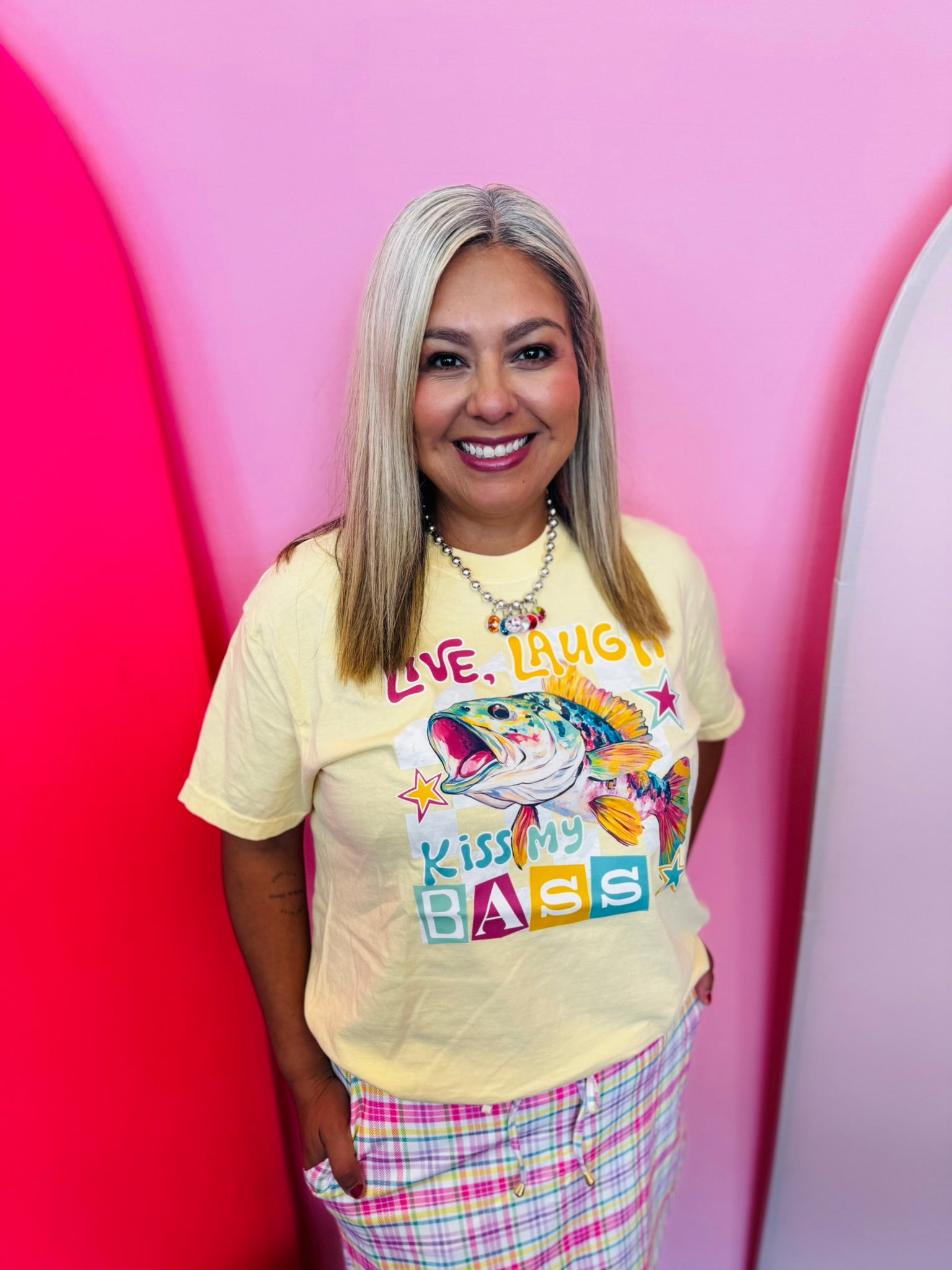 Yellow Comfort Colors tee with colorful bass fish graphic and Live Laugh Kiss My Bass slogan