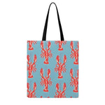Blue tote bag with vibrant orange lobster print and sturdy cream handles