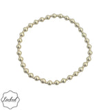 Gold filled beaded bracelet with mixed 2mm and 4mm beads and stretch fit.