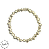 6mm gold filled beaded bracelet with stretch fit and waterproof design.