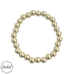 7mm gold filled beaded bracelet with stretch fit and waterproof design.