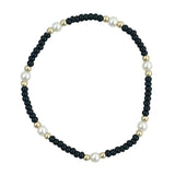 Black waterproof game day bracelet with gold-filled beads and glass pearl accents.