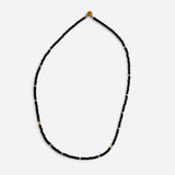 Black waterproof game day necklace with Czech glass beads and polished gold-filled accents.