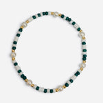 Green and white waterproof game day bracelet with gold-filled beads and glass pearl accents.