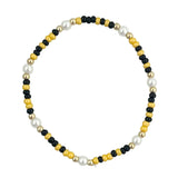 Golden yellow and black waterproof beaded game day bracelet.