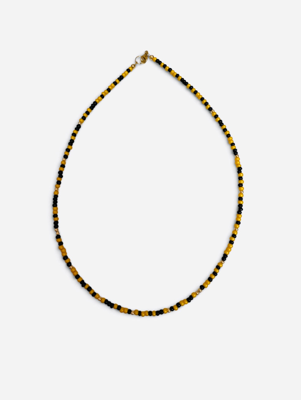 Golden yellow and black waterproof game day necklace with Czech glass beads and gold-filled accents.