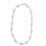 Gold filled and pearl beaded necklace with clasp and elegant layered design.