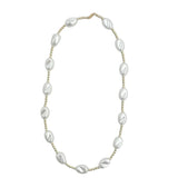 Gold filled and pearl beaded necklace with clasp and elegant layered design.