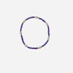 Gold filled bracelet with purple aqua beads, pearl accents, and stretch fit.