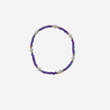 Gold filled bracelet with purple aqua beads, pearl accents, and stretch fit.