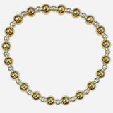 Mixed metal gold and silver beaded stretch bracelet with waterproof design.