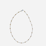 Mixed metal gold and silver beaded necklace with classic patterned design.