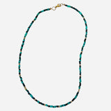 Gold filled necklace with green beads and gold accent details.