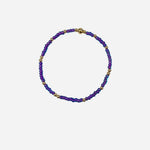 Gold filled bracelet with purple Czech glass beads and stretch fit design.
