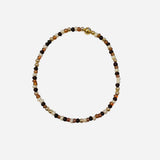Gold filled bracelet with neutral sea sponge Czech glass beads and stretch fit.