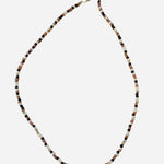Gold filled necklace with neutral sea sponge Czech glass bead accents.