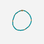 Gold filled bracelet with sea green Czech glass beads and stretch fit design.
