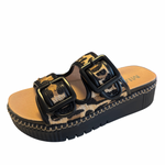 Leopard print sandals with black trim and double buckle straps.