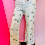 Ivory wide-leg cropped jeans with all-over mallard duck print and high-rise fit.