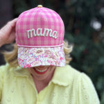 Pink gingham mama hat with floral bill and yellow snapback closure.