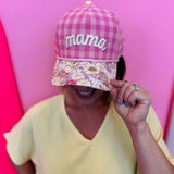 Pink gingham mama hat with floral bill and yellow snapback closure.
