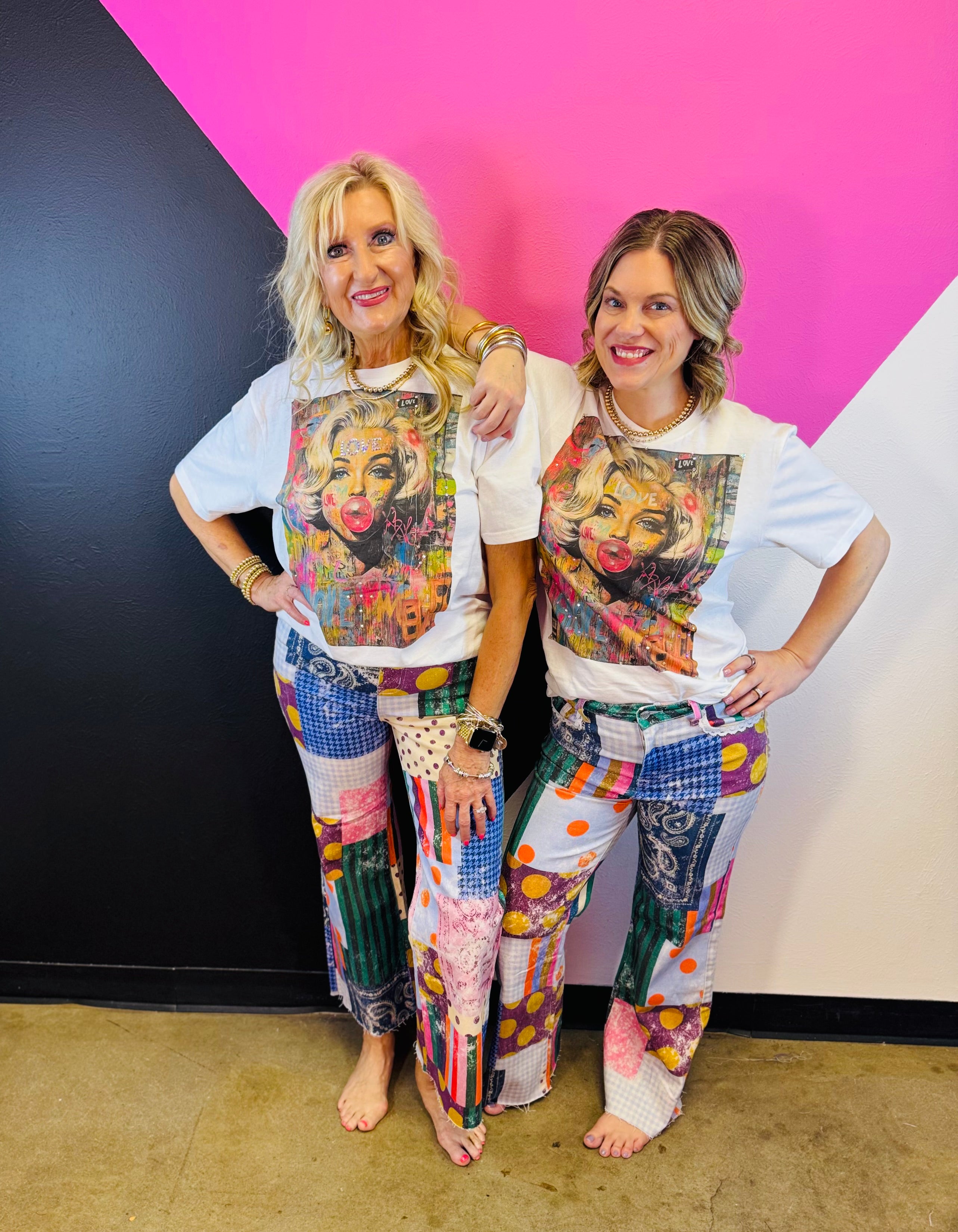 White Marilyn graphic tee with colorful graffiti artwork and rhinestone embellishments.