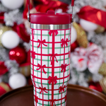Plaid holiday tumbler with red bows, handle, and screw-on lid, 30oz size.