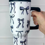 Black bow print tumbler with handle and reusable straw