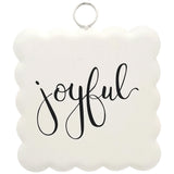 Metal wall sign with scalloped edge and joyful handwritten script