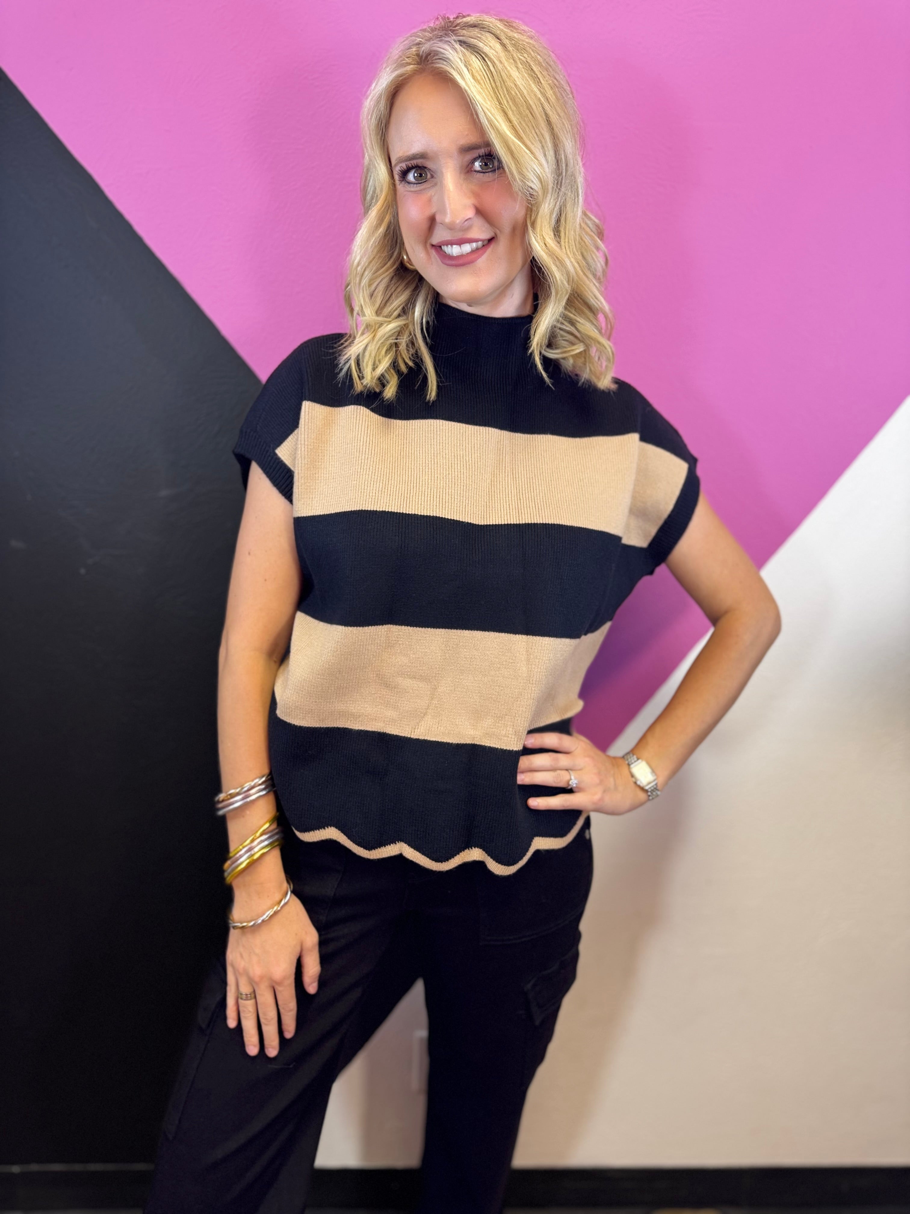 Mocha and black striped mock neck sweater with drop shoulders and contrasting scalloped hem.