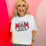 White mom graphic tee with leopard MOM lettering and doodle accents.