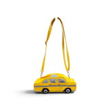 Bright yellow NYC taxi crossbody bag with checkerboard details, wheels, and iridescent windows.