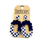 Navy blue checkered acrylic dangle earrings with hypoallergenic stainless steel settings.