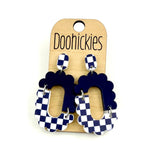 Navy blue checkered acrylic dangle earrings with hypoallergenic stainless steel settings.