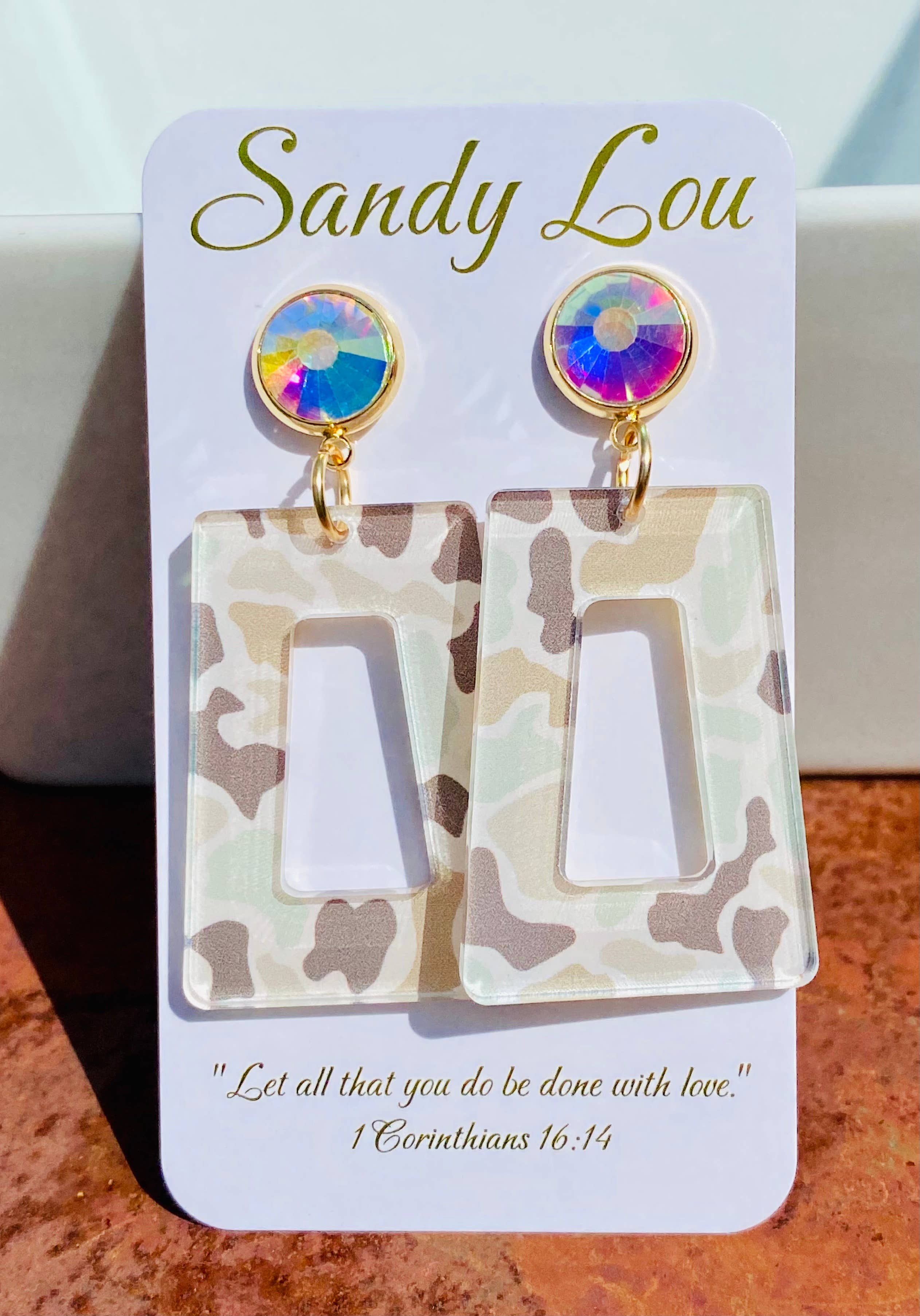 Neutral camo acrylic earrings with AB crystal studs.